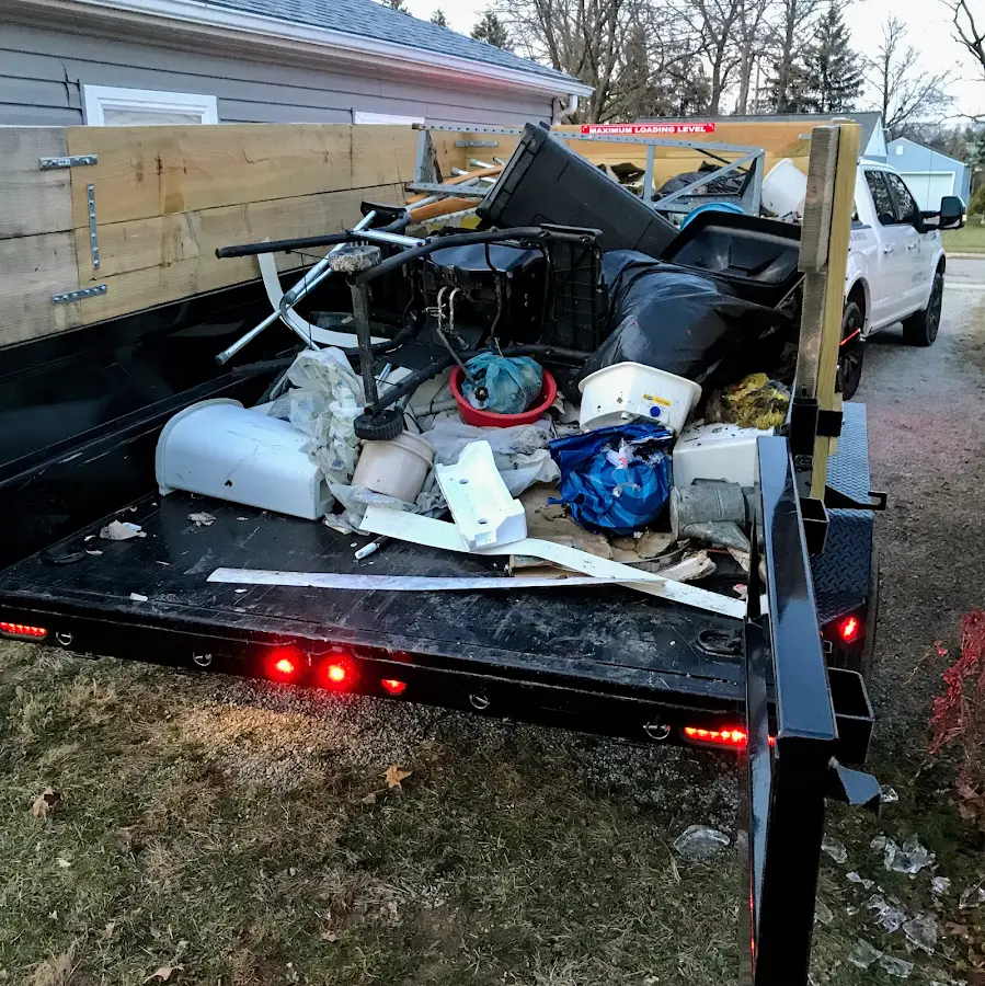 Roll-off dumpster delivered to a residential driveway in Pittsford