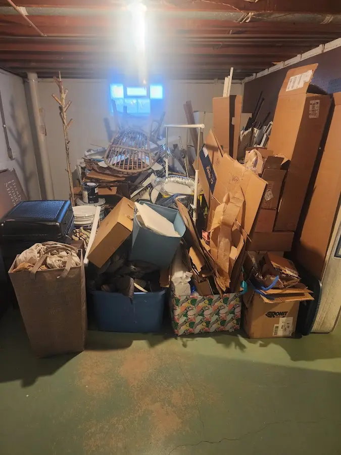 Roll-off dumpster container at job site for 2 Yard Dumpster Rental in Pittsford